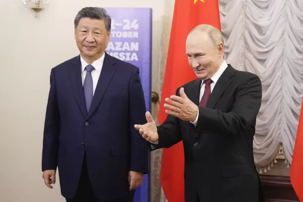 Russian President Vladimir Putin, right, gestures during his meeting with Chinese President Xi Jinping on the sidelines of BRICS Summit at Kazan Kremlin in Kazan, Russia, Tuesday, Oct. 22, 2024. (AP Photo/Alexander Zemlianichenko, Pool)