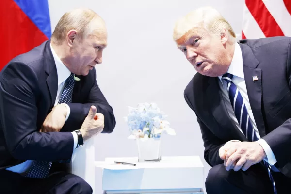 FILE – President Donald Trump, right, meets with Russian President Vladimir Putin at the G-20 Summit in Hamburg, July 7, 2017. (AP Photo/Evan Vucci, File)