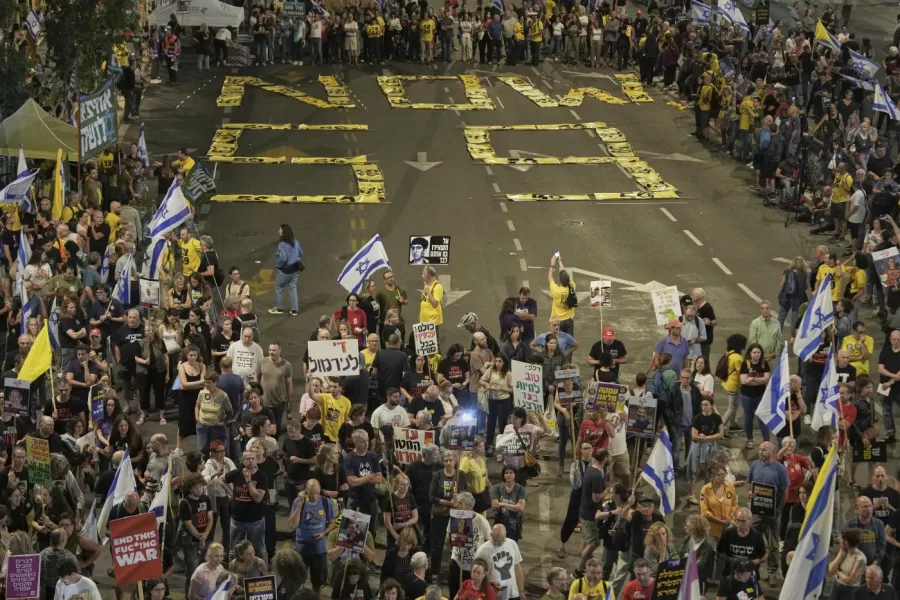 People take part in a protest in Tel Aviv, Israel, Saturday, May 10, 2025, demanding the immediate release of hostages held by Hamas in the Gaza Strip. (AP Photo/Oded Balilty)