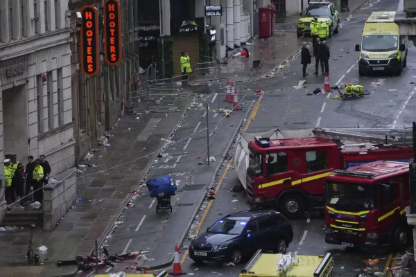 Fans leave as Police and emergency personnel deal with an incident after a car collided with pedestrians near the Liver Building during the Premier League winners parade in Liverpool, England, Monday, May 26, 2025.(AP Photo/Jon Super) 


Associated Press / LaPresse
Only italy and spain