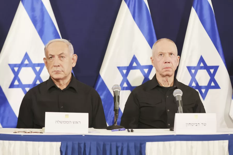 FILE -Israeli Prime Minister Benjamin Netanyahu, left and Defense Minister Yoav Gallant attend a press conference in the Kirya military base in Tel Aviv, Israel, Oct. 28, 2023. (Abir Sultan/Pool Photo via AP, File)