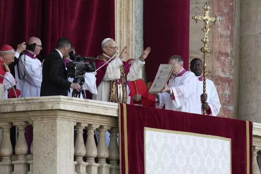 Pope Leo XIV addresses the crowds as he appears on the balcony of St Peter’s Basilica after his election, at the Vatican, Thursday, May 8, 2025. (AP Photo/Gregorio Borgia)