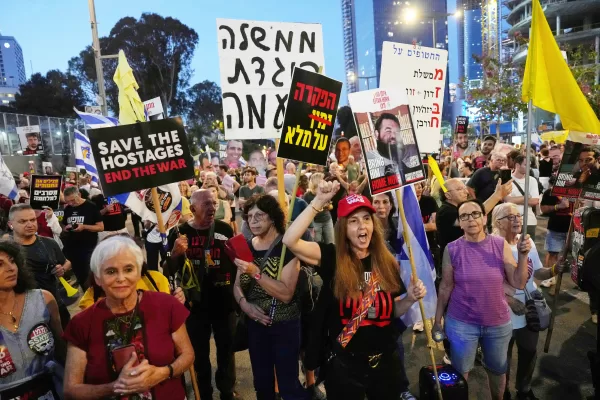 People take part in a protest demanding the end of the war and immediate release of hostages held by Hamas in the Gaza Strip, and against Prime Minister Benjamin Netanyahu’s government, in Tel Aviv, Saturday, May 31, 2025. (AP Photo/Ariel Schalit)