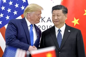 FILE – President Donald Trump, left, shakes hands with China’s President Xi Jinping during a meeting on the sidelines of the G-20 summit in Osaka, Japan, June 29, 2019. (AP Photo/Susan Walsh, File) FILE – President Donald Trump, left, shakes hands with China’s President Xi Jinping during a meeting on the sidelines of the G-20 summit in Osaka, Japan, June 29, 2019. (AP Photo/Susan Walsh, File)