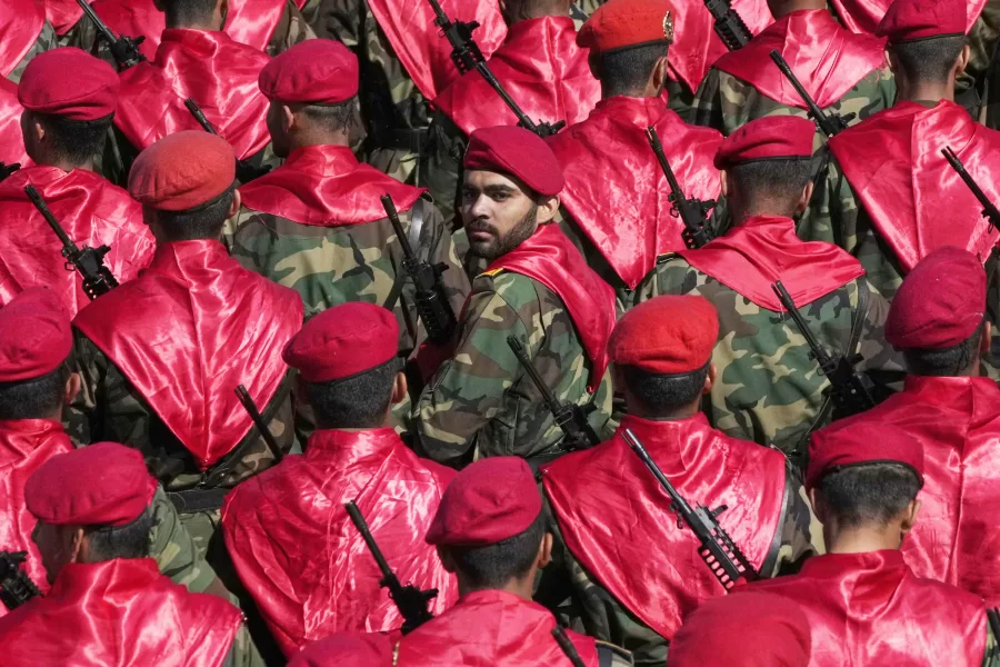 An Iranian army member, center, looks back, among others, as they conclude their march, during a parade commemorating National Army Day in front of the shrine of the late revolutionary founder Ayatollah Khomeini, just outside Tehran, Iran, Friday, April 18, 2025. (AP Photo/Vahid Salemi)


Associated Press/LaPresse