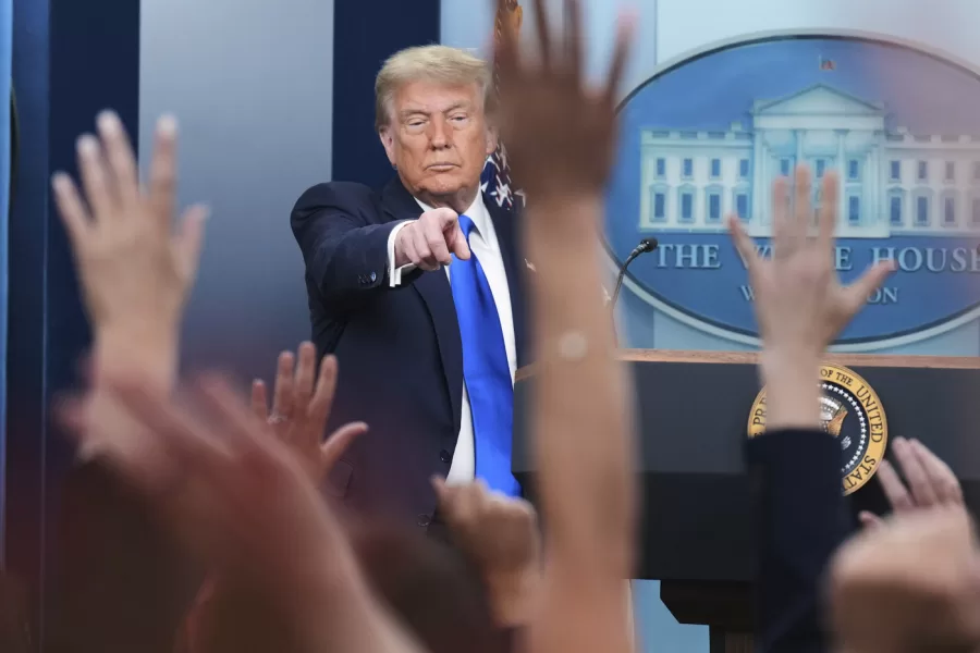 President Donald Trump points to a reporter to answer questions, Friday, June 27, 2025, in the briefing room of the White House in Washington. (AP Photo/Jacquelyn Martin)