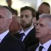 Israel’s Chief of the Mossad David Barnea, right, and Security Agency director Ronen Bar, attend a ceremony marking the Hebrew calendar anniversary of the Hamas attack on October 7 last year, at the Mount Herzl military cemetery in Jerusalem, Israel Sunday Oct. 27, 2024. (Gil Cohen-Magen/Pool Photo via AP)