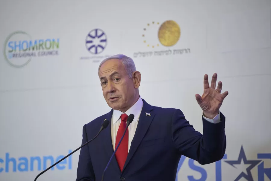 Israeli Prime Minister Benjamin Netanyahu speaks to the audience at a conference in Jerusalem, Sunday, July 27, 2025. (AP Photo/Ohad Zwigenberg)