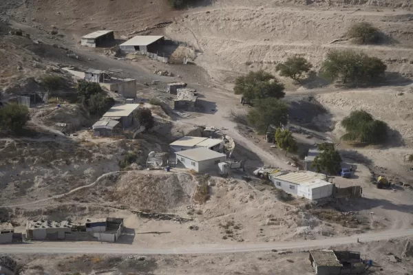 Palestinian hamlets are seen at the E1 area, an open tract of land east of Jerusalem, between the Israeli settlement of Maale Adumim and the occupied West Bank town of Eizariya Thursday, Aug. 14, 2025. (AP Photo/Nasser Nasser)
