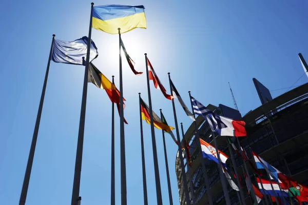 The Ukrainian flag, top, flies with others European flags outside the European Parliament , Tuesday, July 5, 2022 in Strasbourg, eastern France. (AP Photo/Jean-Francois Badias)
