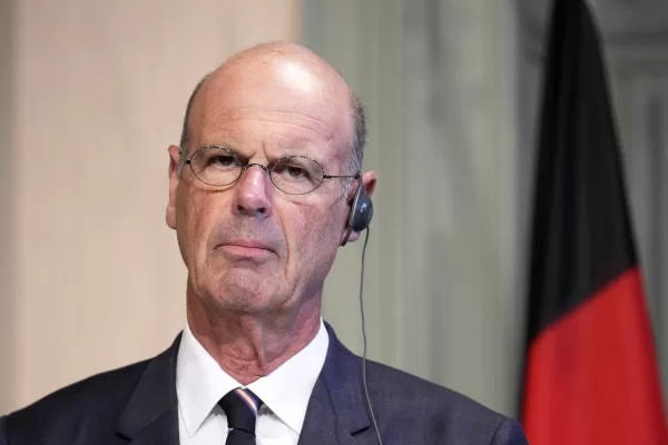 French Finance Minister Eric Lombard speaks to media during a joint news conference and with his German counterpart Lars Klingbeil at Genshagen Palace in Ludwigsfelde, Germany, Wednesday, July 16, 2025. (AP Photo/Ebrahim Noroozi)