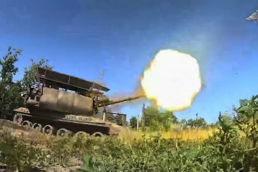 In this photo taken from video released by Russian Defense Ministry Press Service on Thursday, July 31, 2025, a Russian Giatsint-S self-propelled gun fires towards Ukrainian positions on an undisclosed location in Ukraine. (Russian Defense Ministry Press Service via AP)