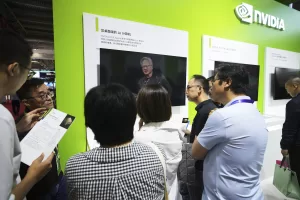 An exhibitor introduces the Nvidia DGX Spark to visitors at the Nvidia exhibition booth during the 3rd China International Supply Chain Expo at the China International Exhibition Center, in Beijing, Thursday, July 17, 2025. (AP Photo/Andy Wong)

Associated Press/LaPresse