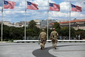 National Guardsmen patrol at the base of the Washington Monument, Monday, Aug. 25, 2025, in Washington. (AP Photo/Rahmat Gul)