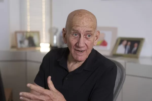 Former Israeli Prime Minister Ehud Olmert during an interview with The Associated Press in his office in Tel Aviv, Israel, Thursday, May 22, 2025. (AP Photo/Ariel Schalit)