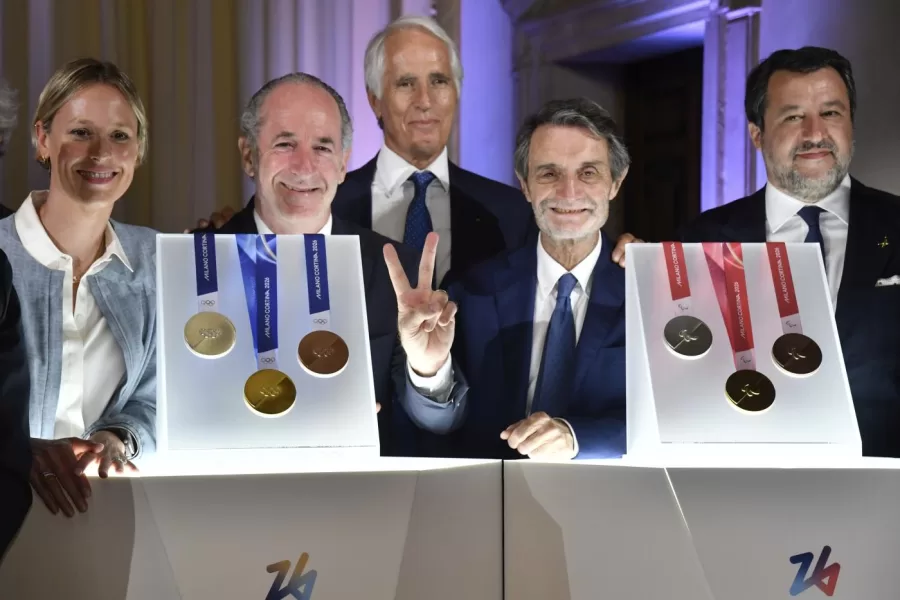From left: Former Italian swimmer Federica Pellegrini, Veneto region President Luca Zaia, Milano Cortina 2026 Foundation President Giovanni Malago Lombardy region President Attilio Fontana and Italy’s vice Premier Matteo Salvini pose for photographers next to Milano Cortina 2026 Winter Olympics and Paralympics medals during the unveiling ceremony in Venice, Italy, Tuesday, July 15, 2025. (AP Photo/Luigi Costantini)

Associated Press/LaPresse