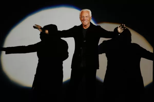 FILE – Giorgio Armani receives his share of applause after presenting his Emporio Fall-Winter 2007-2008 men’s fashion collection, during the Milan Men’s Fashion Week, in Milan, Italy, Monday, Jan. 15, 2007. (AP Photo/Luca Bruno, File)

Associated Press/LaPresse