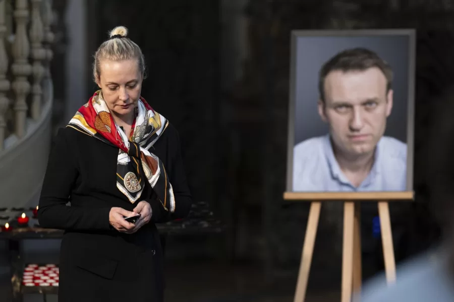 FILE -Yulia Navalnaya, widow of Russian opposition leader Alexei Navalny walks away from his picture after lighting a candle at the end of a service in St. Mary’s Church on the occasion of his birthday, in Berlin, June 4, 2024. (Christoph Gollnow/dpa/dpa via AP, File)