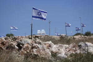 FILE – Israeli flags fly flutter on top of a hill that is adjacent to Palestinian properties that were under attack by Israeli settlers overnight, leaving several burnt vehicles and damaged homes, residents said, in the West Bank village of Bruqin, near Salfit, Friday, May 23, 2025. (AP Photo/Nasser Nasser, File) 


Associated Press / LaPresse
Only italy and spain