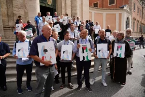 Priests take part in the “Priests against genocide” demonstration in Rome, Monday, Sept. 22, 2025, against the war in Gaza. (AP Photo/Andrew Medichini)