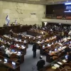 Lawmakers attend a session of the Knesset, Israel’s parliament, in Jerusalem, Monday, July 14, 2025. (AP Photo/Ohad Zwigenberg)