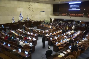 Lawmakers attend a session of the Knesset, Israel’s parliament, in Jerusalem, Monday, July 14, 2025. (AP Photo/Ohad Zwigenberg)
