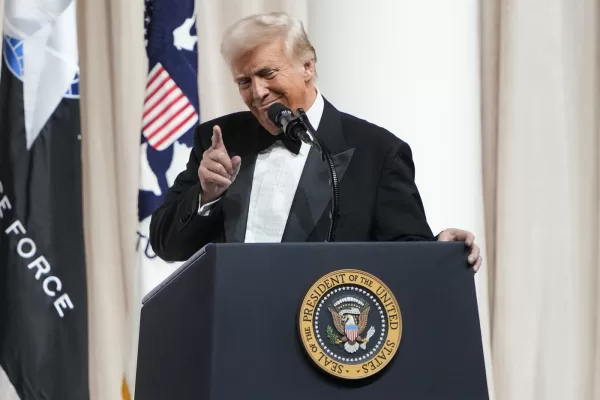 FILE – President Donald Trump speaks at a ball after his inauguration, Jan. 20, 2025, in Washington. (AP Photo/Ben Curtis, File)