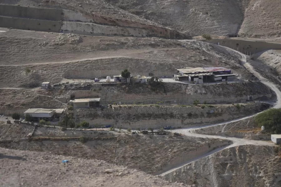 Palestinian hamlets are seen at the E1 area, an open tract of land east of Jerusalem, between the Israeli settlement of Maale Adumim and the occupied West Bank town of Eizariya Thursday, Aug. 14, 2025. (AP Photo/Nasser Nasser)