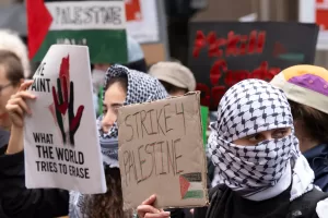 Students strike in support of Palestinians in Montreal on Tuesday, Oct. 7, 2025. (Christinne Muschi/The Canadian Press via AP)