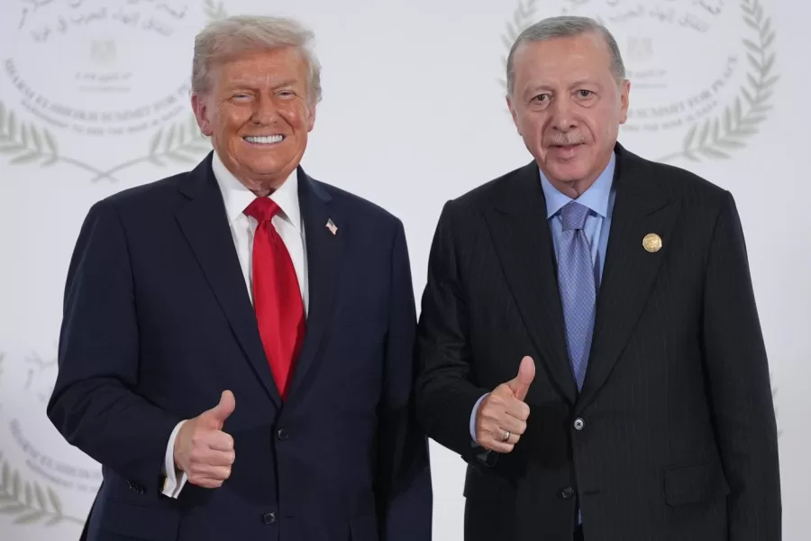 President Donald Trump greets Turkey’s President Recep Tayyip Erdogan during a summit to support ending the more than two-year Israel-Hamas war in Gaza after a breakthrough ceasefire deal, Monday, Oct. 13, 2025, in Sharm El Sheikh, Egypt. (AP Photo/Evan Vucci, Pool)