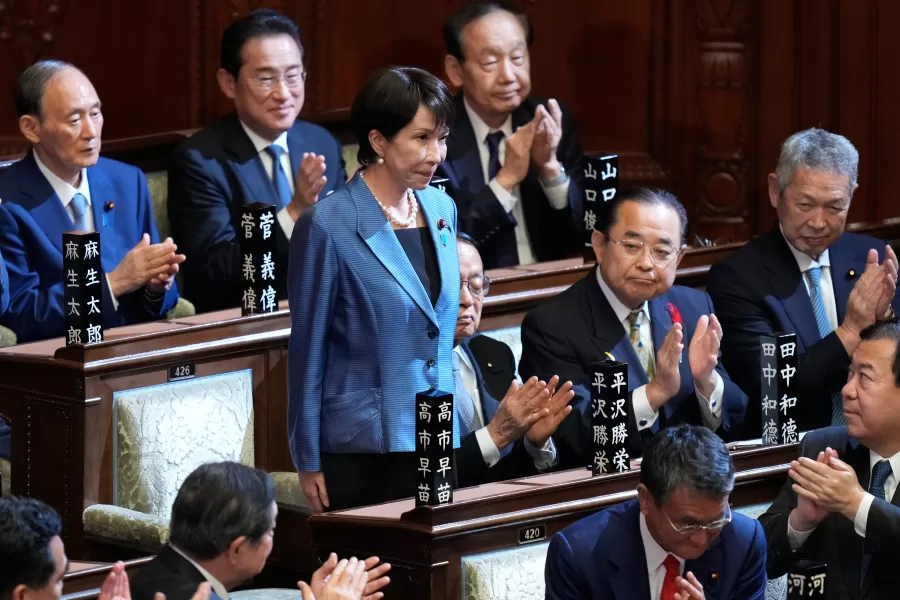 Lawmakers applaud as Sanae Takaichi, standing, was elected as Japan’s new prime minister during the extraordinary session of the lower house, in Tokyo, Japan, Tuesday, Oct. 21, 2025.(AP Photo/Eugene Hoshiko) 


Associated Press / LaPresse
Only italy and spain