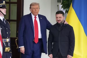 President Donald Trump, left, greets Ukraine’s President Volodymyr Zelenskyy as he arrives at the White House, Monday, Aug. 18, 2025, in Washington. (AP Photo/Alex Brandon)