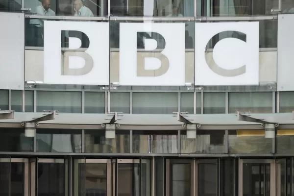FILE – This photo shows a BBC sign outside the entrance to the headquarters of the publicly funded media organization in London, July 19, 2017. (AP Photo/Frank Augstein, File) FILE – This photo shows a BBC sign outside the entrance to the headquarters of the publicly funded media organization in London, July 19, 2017. (AP Photo/Frank Augstein, File)