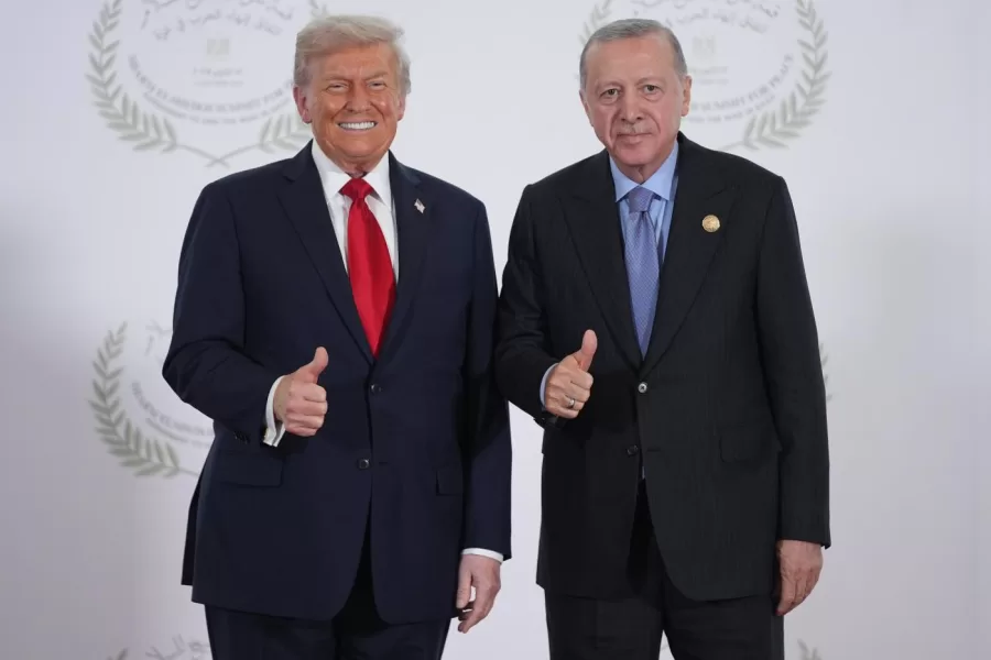 President Donald Trump greets Turkey’s President Recep Tayyip Erdogan during a summit to support ending the more than two-year Israel-Hamas war in Gaza after a breakthrough ceasefire deal, Monday, Oct. 13, 2025, in Sharm El Sheikh, Egypt. (AP Photo/Evan Vucci, Pool)