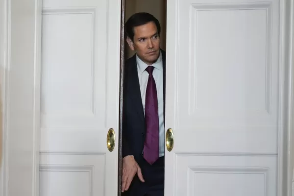 U.S. Secretary of State Marco Rubio looks at the venue of a dinner event with President Donald Trump and business leaders before the event started in Tokyo, Japan, Tuesday, Oct. 28, 2025. (AP Photo/Mark Schiefelbein)