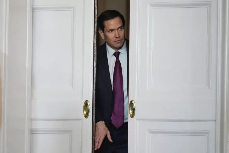 U.S. Secretary of State Marco Rubio looks at the venue of a dinner event with President Donald Trump and business leaders before the event started in Tokyo, Japan, Tuesday, Oct. 28, 2025. (AP Photo/Mark Schiefelbein)