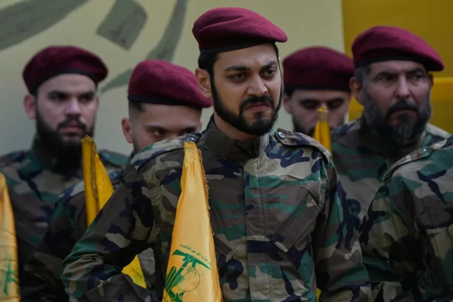 Hezbollah fighters attend the funeral procession of Hezbollah’s chief of staff, Haytham Tabtabai and other fighters who were killed in Sunday’s Israeli airstrike, in the southern suburb of Beirut, Lebanon, Monday, Nov. 24, 2025. (AP Photo/Hussein Malla)