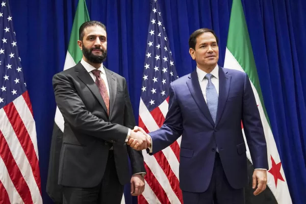 Secretary of State Marco Rubio shakes hands with Syrian interim President Ahmad al-Sharaa at the Lotte New York Palace Hotel, on the sidelines of the 80th United Nations General Assembly at the United Nations headquarters, Monday, Sept. 22, 2025. (Bing Guan/Pool Photo via AP)
