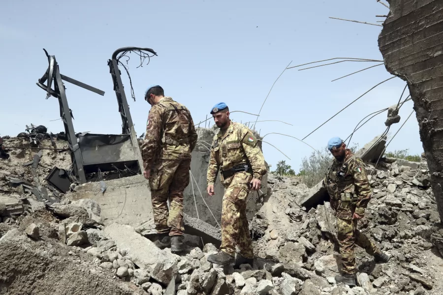 Italian U.N. peacekeeper soldiers inspect a small bridge that was destroyed by an Israeli airstrike, in Maaliya village, south Lebanon, Friday, April 7, 2023. Israel launched rare strikes in southern Lebanon early Friday and pressed on with bombing targets in the Gaza Strip, marking a widening escalation in the region following violence this week at Jerusalem’s most sensitive holy site. Friday’s strikes in southern Lebanon came a day after militants fired nearly three dozen rockets from there at Israel. (AP Photo/Mohammed Zaatari)

Associated Press/LaPresse

EDITORIAL USE ONLY/ONLY ITALY AND SPAIN