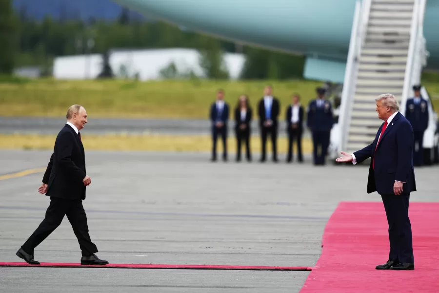 President Donald Trump greets Russia’s President Vladimir Putin Friday, Aug. 15, 2025, at Joint Base Elmendorf-Richardson, Alaska. (AP Photo/Julia Demaree Nikhinson)