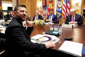 Ukraine’s President Volodymyr Zelenskyy, left, sits before a meeting with President Donald Trump, from right, Vice President JD Vance and Treasury Secretary Scott Bessent in the Cabinet Room of the White House, Friday, Oct. 17, 2025, in Washington. (AP Photo/Alex Brandon)