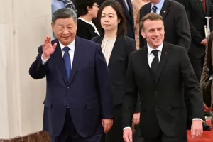 France’s President Emmanuel Macron, right, and China’s President Xi Jinping, left, walk during a state visit at the Great Hall of the People in Beijing Thursday, Dec. 4, 2025. (Adek Berry/Pool Photo via AP) France’s President Emmanuel Macron, right, and China’s President Xi Jinping, left, walk during a state visit at the Great Hall of the People in Beijing Thursday, Dec. 4, 2025. (Adek Berry/Pool Photo via AP)