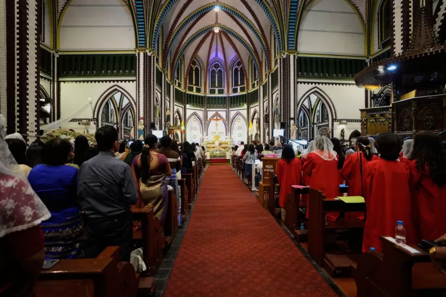 Christians attend a prayer on Christmas