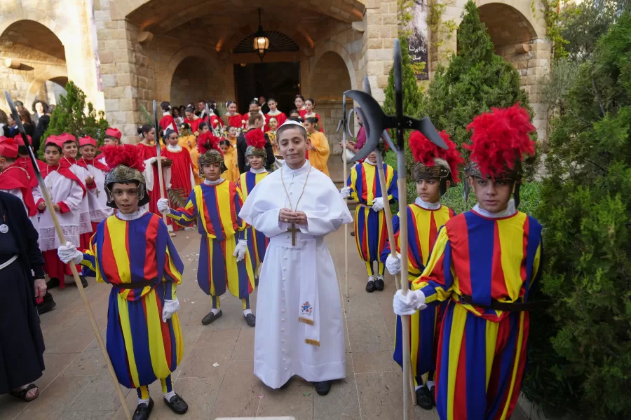 Children dressed up as a pope, cardinals and Vatican Swiss guards wait for the arrival of Pope Leo XIV to visit the De la Croix hospital in Jal el Dib, Lebanon, Tuesday, Dec. 2, 2025. (AP Photo/Domenico Stinellis) 



Associated Press /  LaPresse
Only italy and spain
