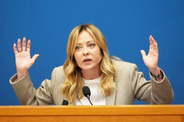 Italian Prime Minister Giorgia Meloni gestures during her annual start-of-the-year press conference in the press room at the Lower Chamber, in Rome, Friday, Jan. 9, 2026. (AP Photo/Andrew Medichini)