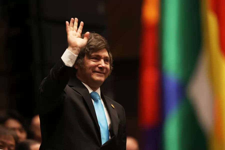 Argentina’s President Javier Milei waves as he attends the swearing-in ceremony of President Rodrigo Paz in La Paz, Bolivia, Saturday, Nov. 8, 2025. (Luis Gandarillas, Pool Photo via AP)