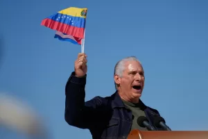Cuban President Miguel Diaz-Canel attends a rally in Havana, Cuba, Saturday, Jan. 3, 2026, in solidarity with Venezuela after the U.S. captured President Nicolas Maduro and flew him out of Venezuela. (AP Photo/Ramon Espinosa)