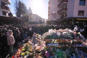 People gather during a memorial procession in Crans-Montana, Swiss Alps, Switzerland, Sunday, Jan. 4, 2026, after a devastating fire in Le Constellation bar left dead and injured during the New Year’s celebrations. (AP Photo/ Antonio Calanni)