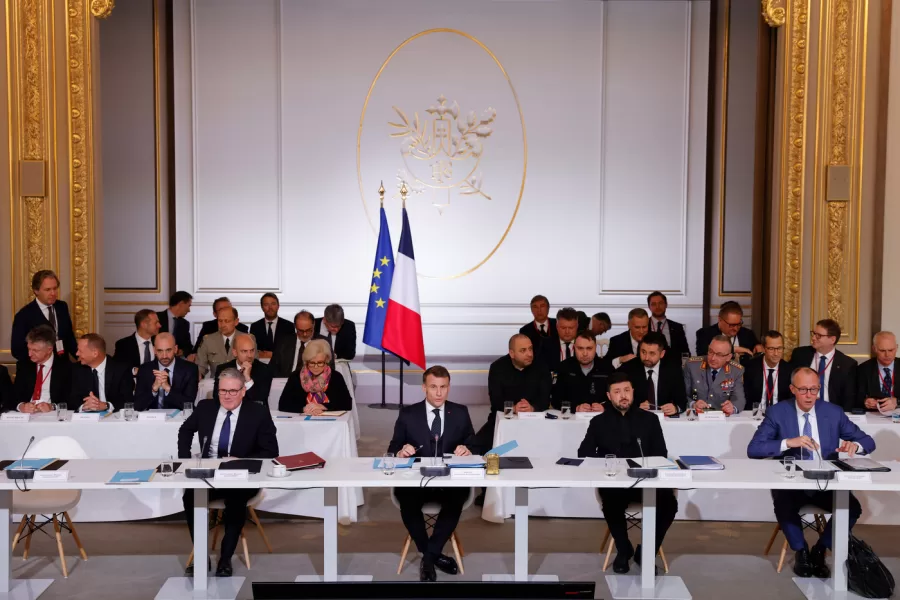 French President Emmanuel Macron, center, Ukraine’s President Volodymyr Zelenskyy, second right, British Prime Minister Keir Starmer, left, and German Chancellor Friedrich Merz attend a meeting of the Coalition of the Willing at the Elysee Palace in Paris, France, Tuesday, Jan.6, 2026. (Yoan Valat, Pool photo via AP)
