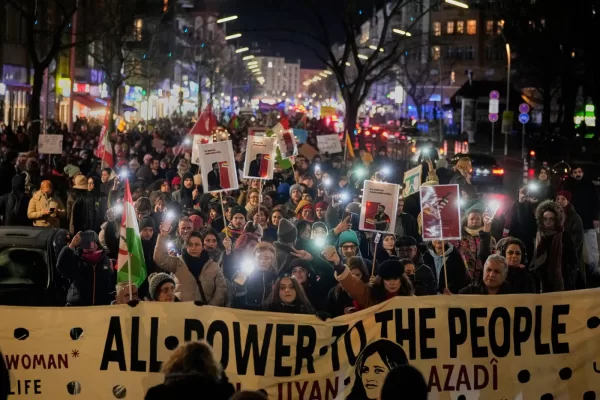 People take part in a rally in support of anti-government protests in Iran, Berlin Germany, Wednesday, June 14, 2026. (AP Photo/Ebrahim Noroozi)